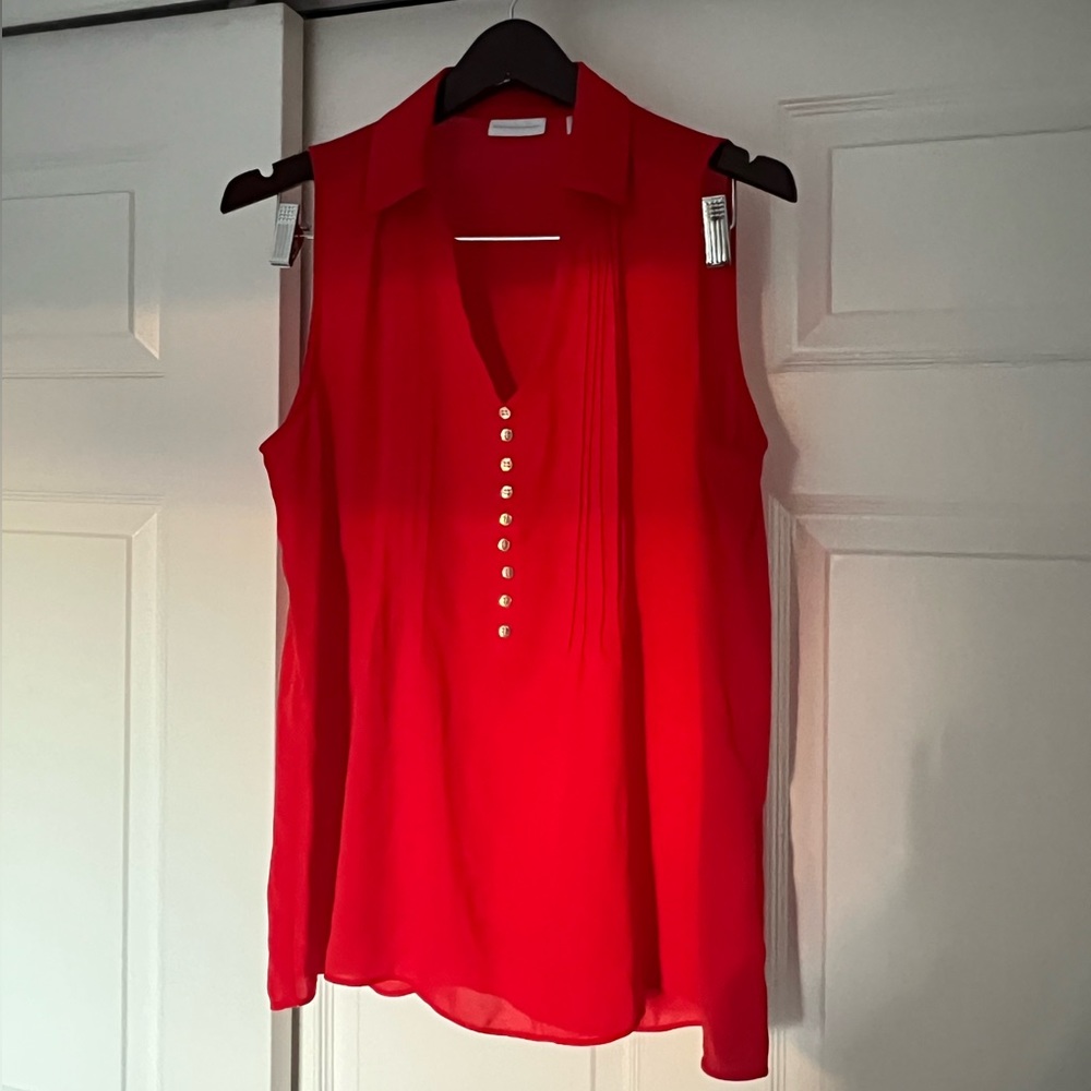 Red button up sleeveless blouse